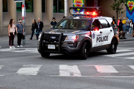 Toronto, ON, Canada - JUNE 21, 2019: Police car during the demonstration of the street of Toronto at Trans March and Pride Month.のeditorial素材