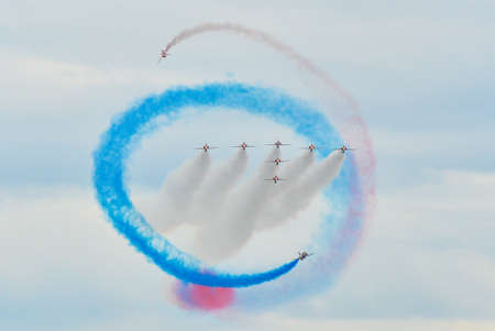 Hawk T1 jet operated by the British Royal Air Force's (RAF) Red Arrows aerobatic demonstration team, performs a maneuver at the 70th annual Canadian International Air Show (CIAS) over Lake Ontario in Toronto, ON, Canada on September 1, 2019のeditorial素材