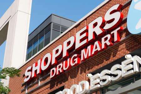 Toronto, ON, Canada - September 30, 2021: The logo and brand sign of Shoppers Drug Mart Store in...