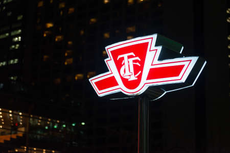 Toronto, ON, Canada â December 08, 2021: The sign of Toronto Transit Commission (TTC) transport company in Downtown Toronto. The TTC is the operator of public transport like streetcars, buses, and subway in the cityのeditorial素材