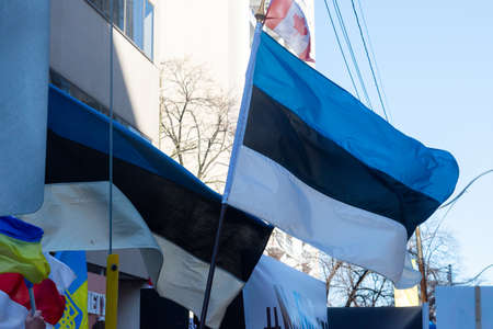 Toronto, Ontario, Canada â March 6, 2022:  Demonstrators with yellow and blue Ukraine flags and anti-war signs near Russian consulate in Toronto ask to close the airspace over Ukraine during the war in Ukraineのeditorial素材