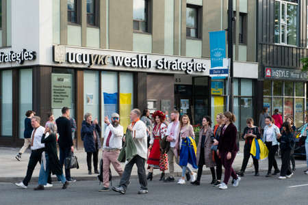 Toronto, ON, Canada â€“ May 19, 2022:  People in Ukrainian national clothes - Vyshivanka are...