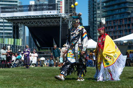 Toronto, ON, Canada - June 18, 2022: Dancer during the National Aboriginal Day and Indigenous Arts Festival. The festival celebrates Indigenous and Metis culture through traditional and contemporary music, educational programming, storytelling, dance, theのeditorial素材