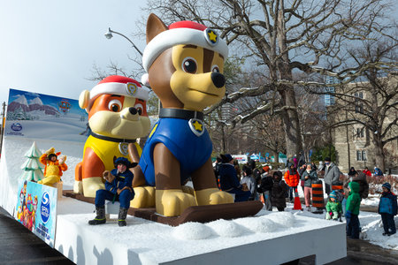 Toronto, ON, Canada â November 20, 2022: People take part in the 118th Toronto Santa Claus Parade in Toronto, Canada on November 20, 2022のeditorial素材