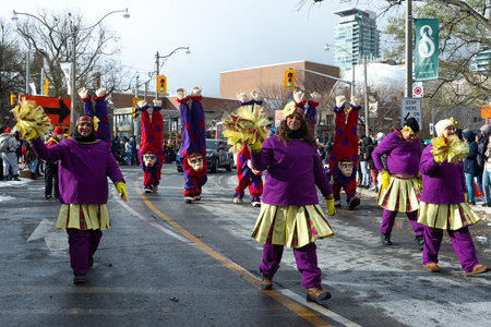 Toronto, ON, Canada â November 20, 2022: People take part in the 118th Toronto Santa Claus Parade in Toronto, Canada on November 20, 2022のeditorial素材