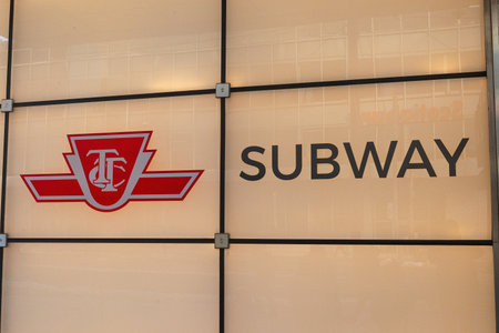 Toronto, ON, Canada â December 17, 2022: The sign of the Toronto Transit Commission (TTC) transport company in Downtown Torontoのeditorial素材