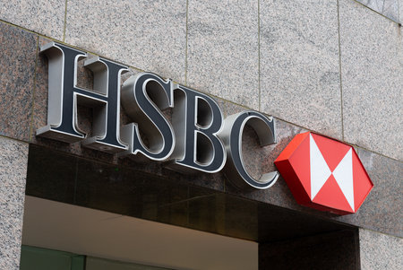 Toronto, ON, Canada â December 17, 2022: The logo and brand sign of HSBC bank. HSBC Holdings plc is a British multinational universal bank and financial services holding companyのeditorial素材