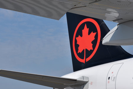 Toronto, ON, Canada â€“ December 17, 2022: The sign of Air Canada. Air Canada is the flag...