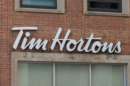 Toronto, ON, Canada - December 08, 2022: Tim Hortons Inc., commonly nicknamed Tim's, or Timmie's is a Canadian multinational coffeehouse and restaurant chainのeditorial素材