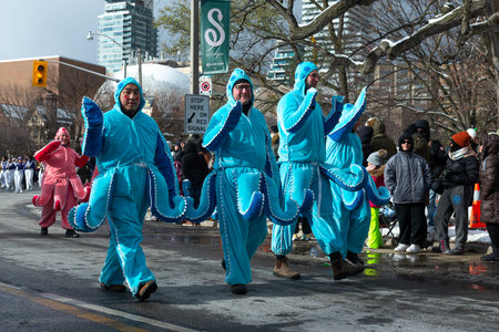 Toronto, ON, Canada â November 20, 2022: People take part in the 118th Toronto Santa Claus Parade in Toronto, Canada on November 20, 2022のeditorial素材