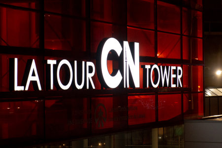 Toronto, ON, Canada â August 17, 2023: CN Tower entrance and CN Tower sign in English and French language in Toronto, Canada.のeditorial素材