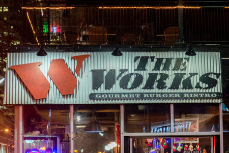 Toronto, ON, Canada â March 30, 2023: View at the sign of the Hamburger restaurant The Works in Torontoのeditorial素材