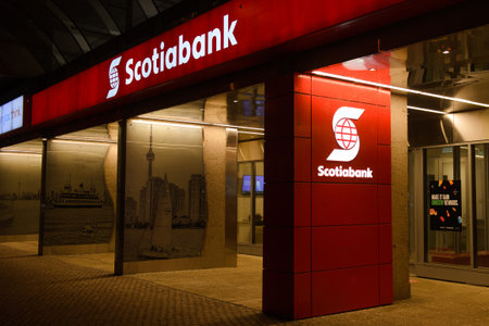Toronto, ON, Canada â August 23, 2023: The logo and brand sign of Scotiabank in downtown Torontoのeditorial素材