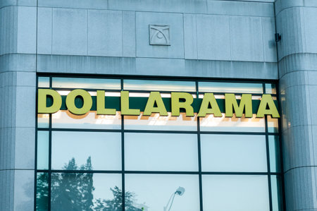 Toronto, ON, Canada â October 18, 2023: Close-up of Dollarama store sign on the building. Dollarama Inc. is a Canadian dollar store retail chainのeditorial素材