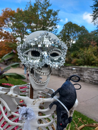 Toronto, ON, Canada - October 31, 2024: A two-storey home features glowing Halloween inflatables on...