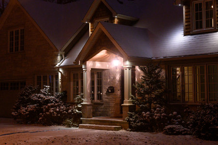 Toronto, ON, Canada - December 4, 2025: View of a house decorated with Christmas lights.のeditorial素材