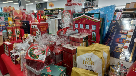 Toronto, ON, Canada - November 26, 2025: Holiday decorations and shoppers fill the aisles of a large retail store during the busy Black Friday shopping season.のeditorial素材