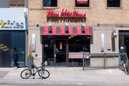 Toronto, ON, Canada - January 20, 2024: Tim Hortons Inc., commonly nicknamed Tim's, or Timmie's is a Canadian coffeehouse and restaurant chainのeditorial素材