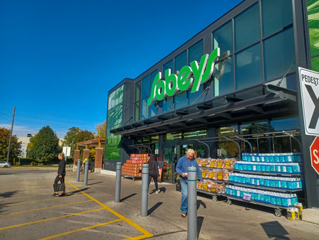 Toronto, ON, Canada â€“ March 30, 2025: The logo and brand sign on Canadian retail business...