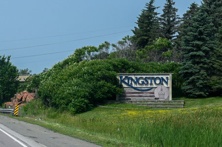 Kingston, ON, Canada - September 18, 2025: A welcome sign for the city of Kingston is visible from a highway on a cloudy day.のeditorial素材