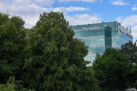 Toronto, ON, Canada â June 20, 2025: View at the Paymentus Fintech IT company logo.のeditorial素材