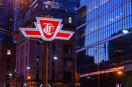 Toronto, ON, Canada â February 24, 2024: The sign of the Toronto Transit Commission transport company in Downtown Torontoのeditorial素材