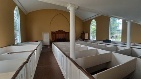 Morrisburg, ON, Canada - August 3, 2025: Interior of a historic church at Upper Canada Village,...
