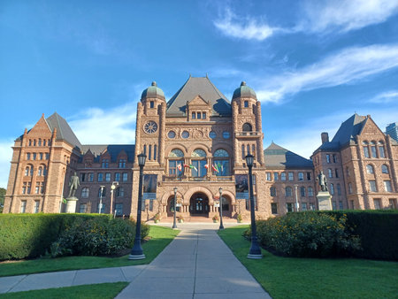 Toronto, ON, Canada - June 25, 2025: The historic Legislative Building of Ontario stands majestically under a bright blue summer sky.のeditorial素材