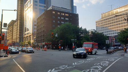 Montreal, QC, Canada - July 6, 2025 - Generic view at the a busy street in downtown Montreal,...
