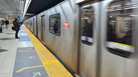 Toronto, ON, Canada - March 14, 2026: A subway train arriving at a station in Toronto, with...