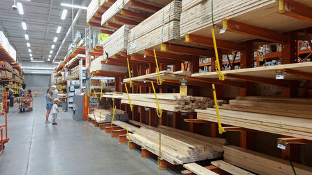 Toronto, ON, Canada - June 3, 2026: People shopping for lumber and construction materials inside a large home improvement warehouse store.