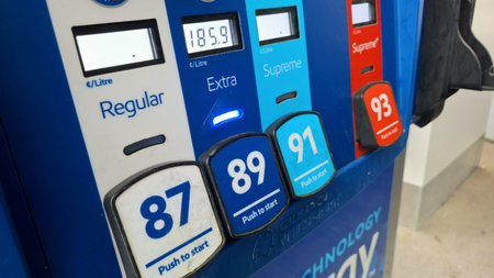 Toronto, ON, Canada - August 12, 2026: A close up of a gas station pump showing different fuel grades and prices.