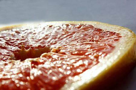 Grapefruit slice Isolated. Pieces of citrus. Texture. Vitamin complex. View from aboveの写真素材