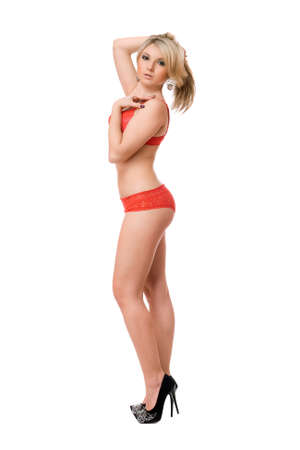 Young playful blond woman. Isolated on whiteの写真素材