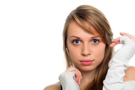 Portrait of a pretty young lady with beautiful straight blond hair. Isolated on whiteの写真素材
