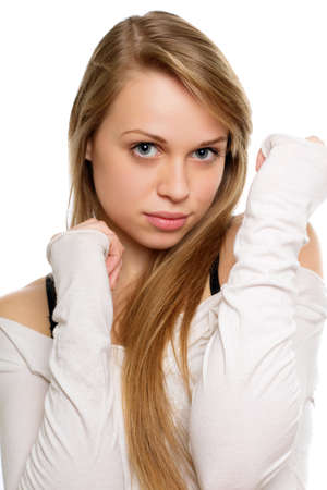Portrait of a young lady with beautiful straight blond hair. Isolated on whiteの写真素材