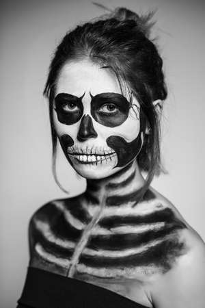 Portrait of woman painted like a zombie. Monochromeの写真素材