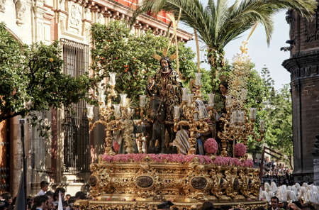 Mystery of the brotherhood dela borriquita through the streets of Seville in Holy Week