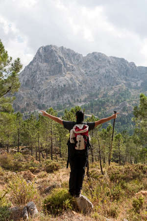 The hiker WHO admire the mountain while relaxingの写真素材