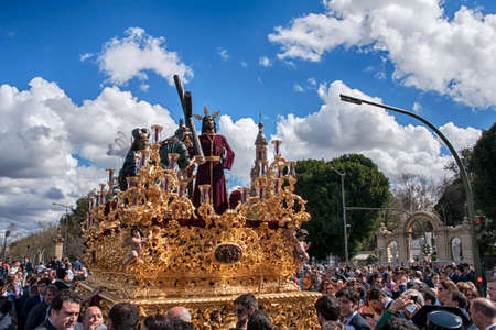 With the cross Jesus on the shoulder, brotherhoods of penance of Holy Week in Seville, Peace