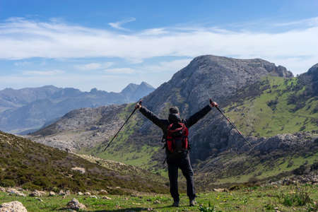 hiker on top of the mountain and facing the Torcal de Antequeraのeditorial素材