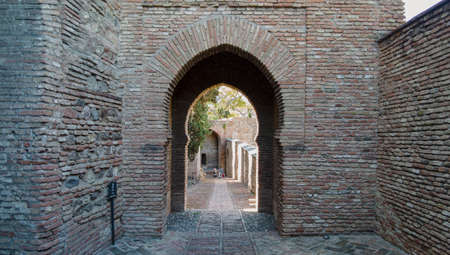 old Moorish wall of the Alcazaba of Malaga, Andalusiaのeditorial素材