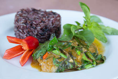 green curry salmon with brown rice at S and P restaurant