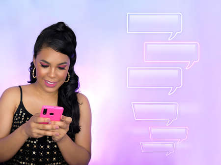 Girl texting sms messages holding her pink cell phone with both hands