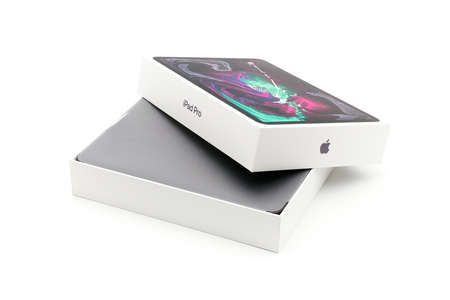 Rome, Italy - Jannuary 2020: Apple iPad Pro 2019 unboxing on a white background isolated. Open iPad...