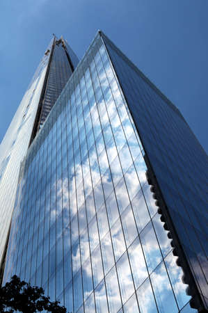The Shard, also referred to as the Shard of Glass, Shard London Bridge and formerly London Bridge Tower, is a 95-storey skyscraper in London  Its construction began in March 2009; it opened to the public on 1st Feb 2013 のeditorial素材