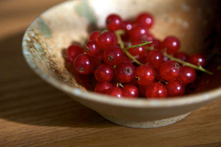 A bowl of redcurrants の写真素材