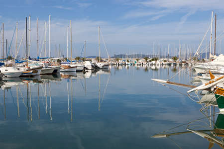 Sailing yachts in Alghero Marina, Sardinia, Italy の写真素材