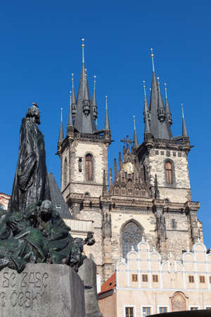 The Jan Hus Statue looks up to Tyn Church, Old Town Square, Prague, Czech Republicの写真素材