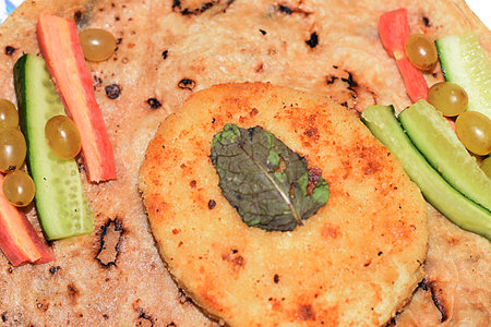 Asian Food Plate. Burger, Flat Bread, Vegetables, Fruit, Salad Servingの写真素材